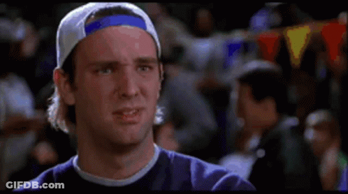 Man In Baseball Cap And Purple Shirt Making A Face GIF