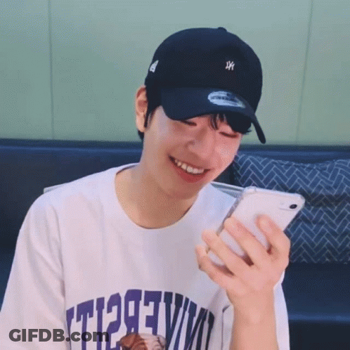 Man In Baseball Cap And T1293vm T-Shirt GIF