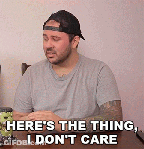 Man In Baseball Cap At Table Saying Here's The Thing I Don't Care GIF