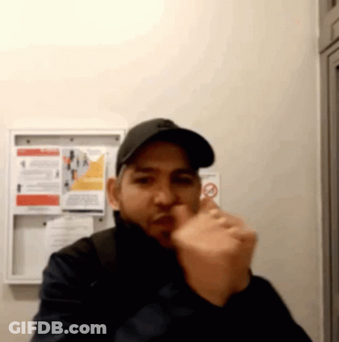 Man In Baseball Cap Giving Thumbs Up GIF