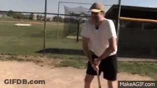 Man In Baseball Cap Holding Baseball Bat GIF