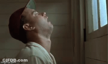 Man In Baseball Cap Looking Up GIF