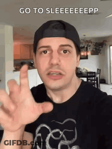 Man In Baseball Cap Making Funny Face GIF