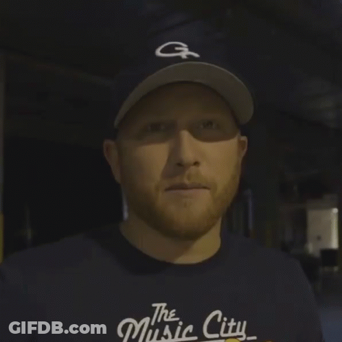 Man In Baseball Cap Saying Bummer GIF
