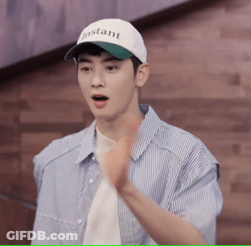 Man In Baseball Cap Saying Instant GIF