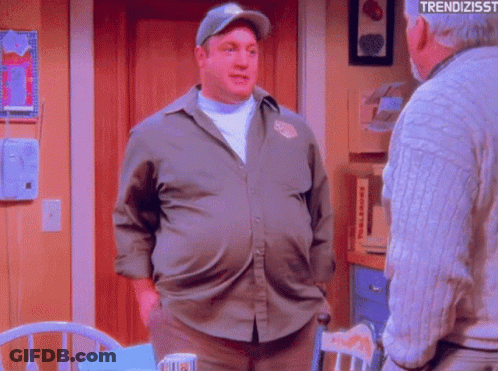 Man In Baseball Cap Talking To Older Man GIF