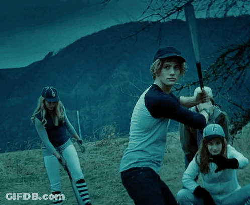 Man In Baseball Cap With Letter G Swings Bat GIF