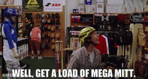 Man In Baseball Store Saying Well Get A Load Of Mega Mitt GIF