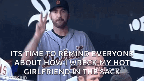 Man In Baseball Uniform Giving Peace Sign In Dugout GIF