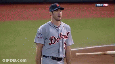 Man In Baseball Uniform Giving Peace Sign In Dugout GIF