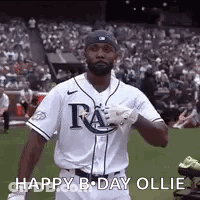 Man In Baseball Uniform Holding Bat GIF