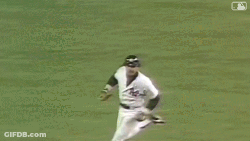 Man In Baseball Uniform Running On Field GIF