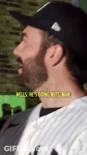 Man In Baseball Uniform Saying Going Nuts GIF