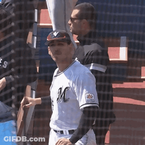 Man In Baseball Uniform With Letter M GIF