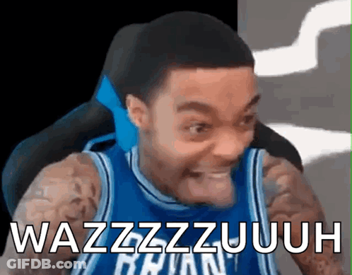 Man In Basketball Jersey Making Funny Face Saying Wazzzzzzuuh GIF