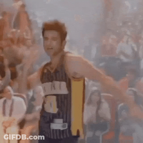Man In Basketball Jersey Number 31 Standing Before Crowd GIF