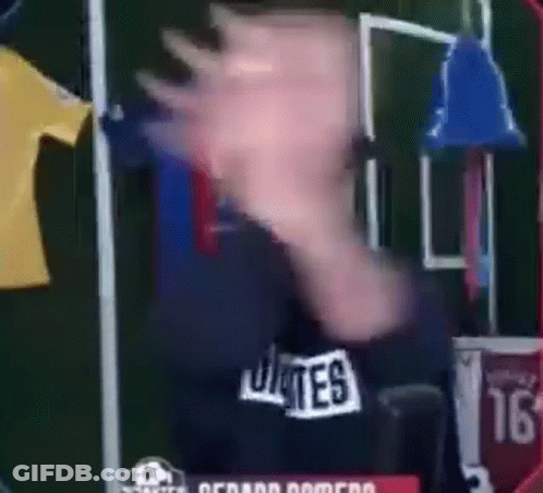 Man In Bates Shirt In Front Of Soccer Field GIF