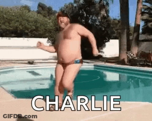 Man In Bathing Suit Jumping Into Pool GIF