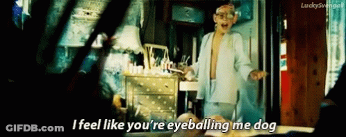 Man In Bathrobe Saying Eyeballing Me Dog GIF