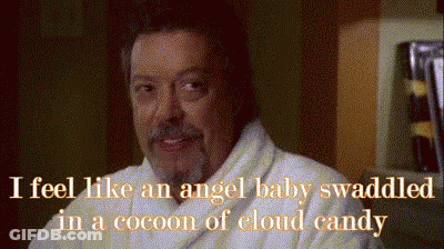 Man In Bathrobe Saying I Feel Like An Angel Baby Swaddled In A Cocoon Of Cloud Candy GIF