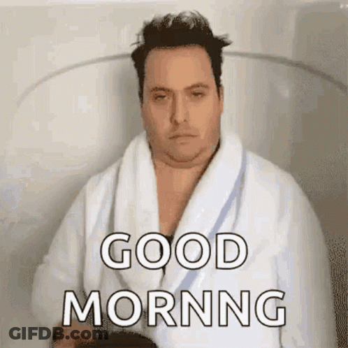 Man In Bathrobe Sitting In Bathtub Says Good Morning GIF