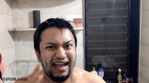 Man In Bathroom With Soap Sign GIF