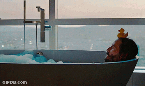 Man In Bathtub With Rubber Duck On Head GIF