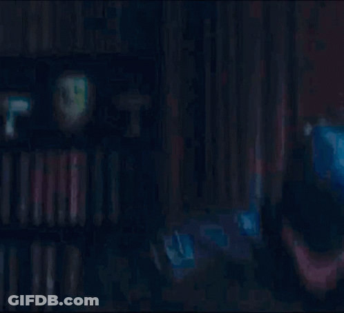 Man In Batman Costume Close Up Dark Room GIF