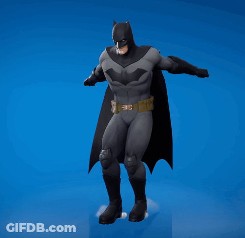 Man In Batman Costume Making Peace Sign GIF