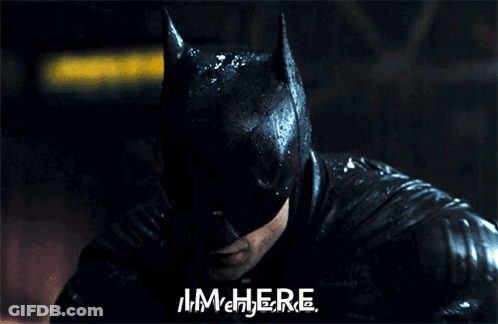 Man In Batman Costume Saying I'm Here GIF