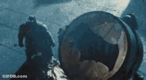 Man In Batman Costume Walking GIF