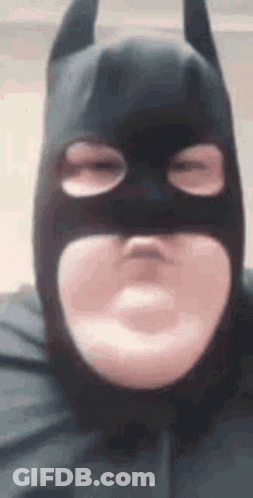 Man In Batman Mask Making Funny Face GIF