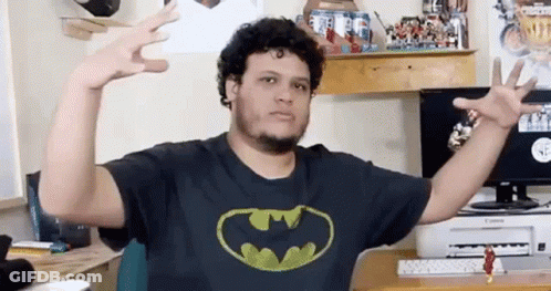 Man In Batman T-Shirt Making Funny Face GIF