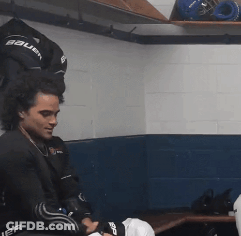 Man In Bauer Jersey In Locker Room GIF