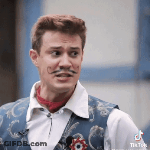 Man In Bayern Munich Jersey Looking At Camera GIF