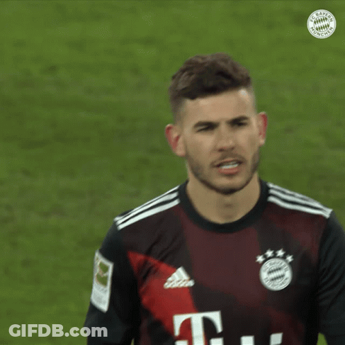 Man In Bayern Munich Jersey Looking At Camera GIF