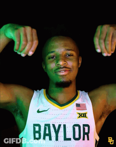 Man In Baylor Jersey Flexing Muscles GIF