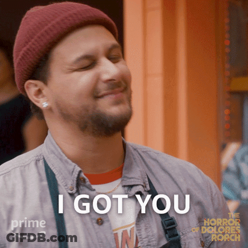 Man In Beanie And Apron Smiling Says I Got You GIF