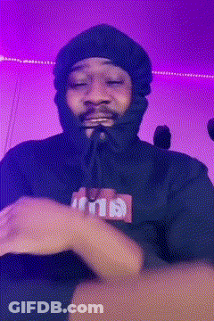 Man In Beanie And Black Hoodie Making Funny Face GIF