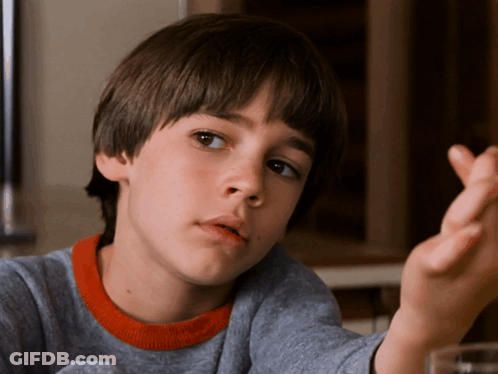 Man In Beanie And Black T-Shirt Saying His Head GIF