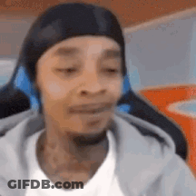 Man In Beanie And Headphones Making Funny Face GIF