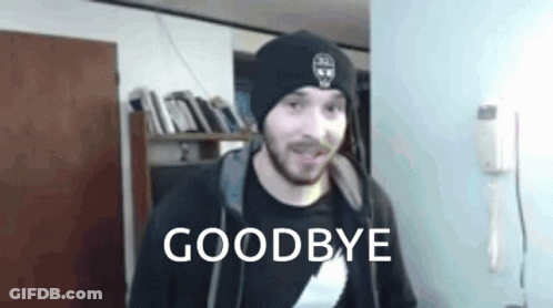 Man In Beanie And Hoodie Standing By Goodbye Sign GIF