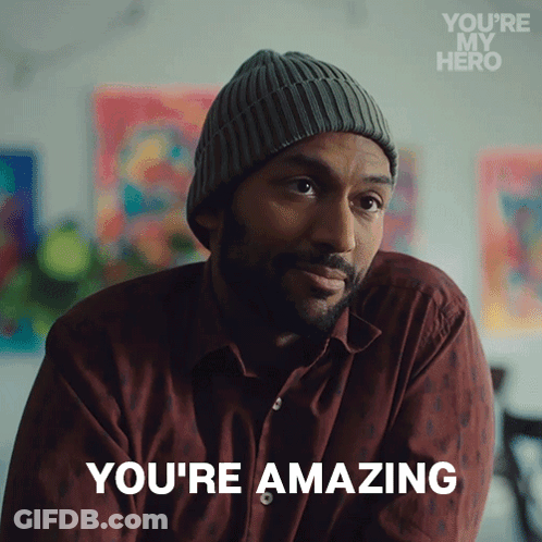 Man In Beanie And Maroon Shirt Says You're Amazing GIF