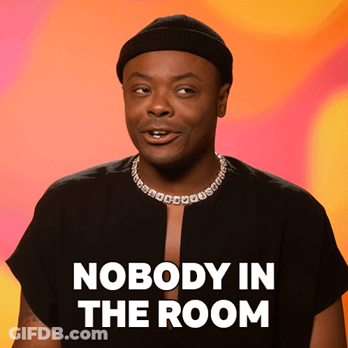 Man In Beanie And Necklace Saying Nobody In The Room GIF