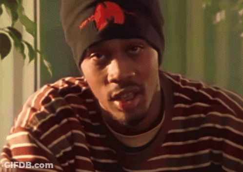 Man In Beanie And Striped Shirt With Red Circle GIF