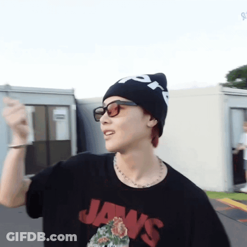 Man In Beanie And Sunglasses Wearing Jaws T-Shirt GIF