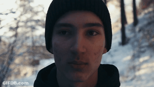 Man In Beanie Close Up GIF
