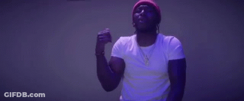 Man In Beanie Dancing In Dark Room GIF