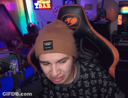 Man In Beanie Sitting In Chair With Bar Sign GIF