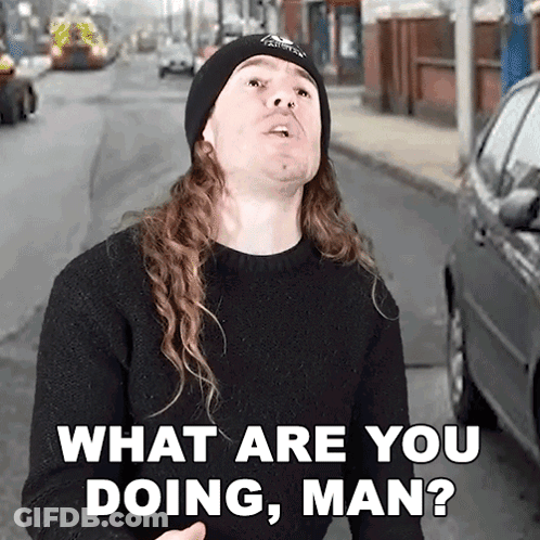 Man In Beanie What Are You Doing Man GIF